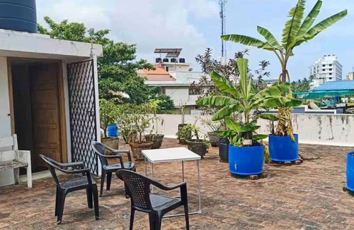 Palayam Apartment | Spacious AC Bedroom with Attached Bathroom, in the Heart of Trivandrum