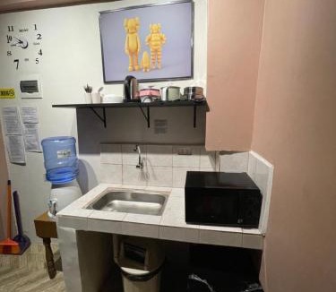 Diliman Apartment | Staycation residences hotel quality transient Netflix wifi international cable tv hi speed fiber internet sanitize