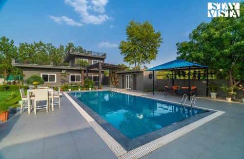 Faridabad Villa | StayVista at Cloudberry Estate - Pet Freindly Villa with Private Outdoor Pool & Lawn