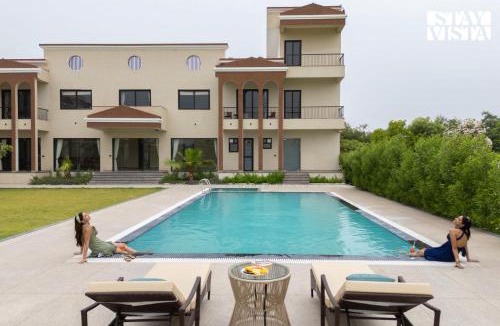 Jaipur District Villa | StayVista at Eleganza Villas with BBQ, Lawn, Bonfire