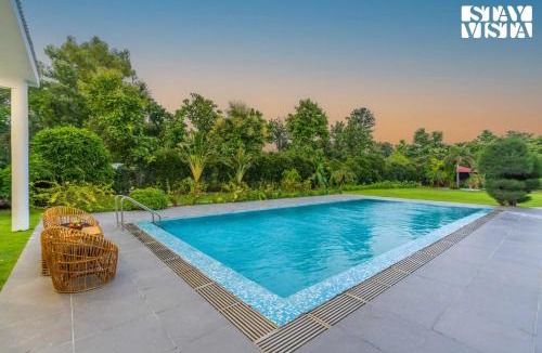 Gurugram Villa | StayVista at Imperial Isle 4BHK with FREE BF Luxury Pool Villa in Sohna Delhi