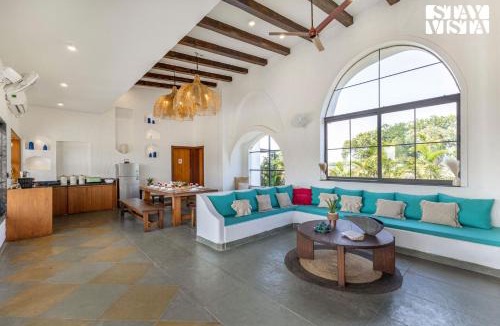 Rau Villa | StayVista at Lotus by the lake with Pool, BBQ & Lawn