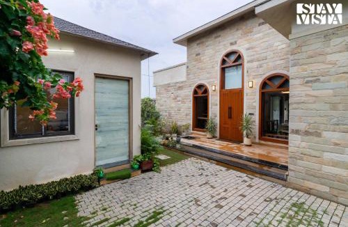 Jaipur Villa | StayVista at Rustic Roots with Bonfire, Lawn