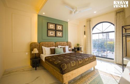 Malviya Nagar Apartment | StayVista at Sabora Green with AC, Wi-Fi