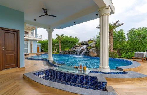 Gurugram Villa | StayVista at Serenity Farms with Pool, Lawn, Bonfire & BBQ