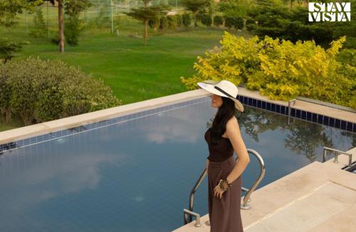 Rajawas Villa | StayVista at The Stone Age Home with Pool, Lawn, BBQ & Bonfire