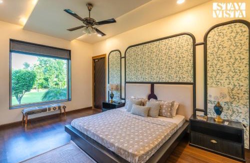 Gurugram Villa | StayVista at Wandering Vines 4BHK with FREE Breakfast ,Indoor Pool in Delhi Sohna