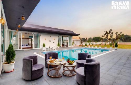 Jaipur Villa | StayVista's Kundan Villa - Pet-Friendly Villa with Sprawling Lawn, Outdoor Pool