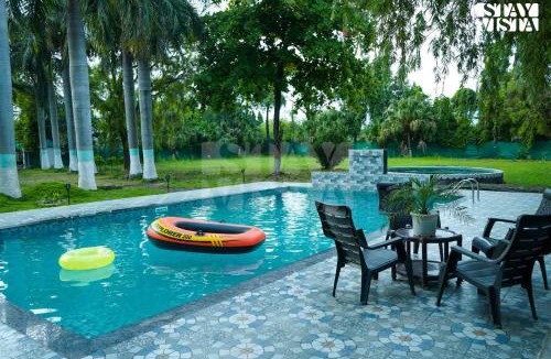 Bhopal Villa | StayVista's Palm Perle Villa - Pet-Friendly Retreat with Terrace, Lawn & Pool Table