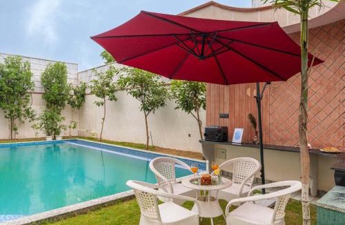 Jaipur Villa | StayVista's The Tree House - City-Center Villa with Outdoor Pool, Spacious Balconies & Vast Lawn