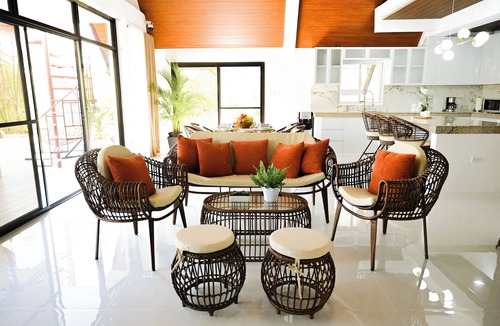 Balingasay Cabin | Step into an A-Frame home, where white tropical design meets ultimate comfort.