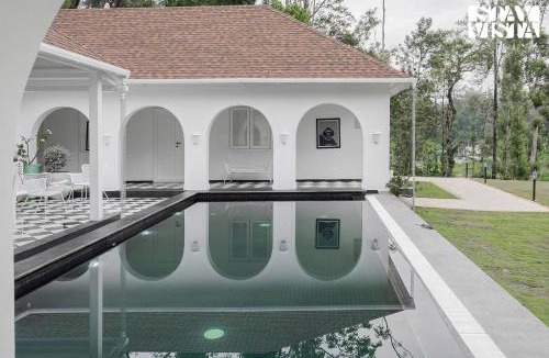 Suntikoppa Villa | The Mudra Manor 4BR Coorg temperature controlled pool Villa