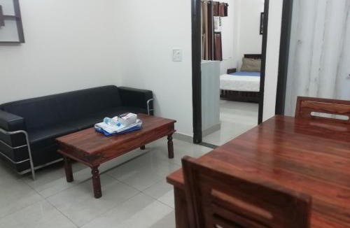 Sainik Farm House | The Raveesh E24 - 2BHK Serviced Apartment