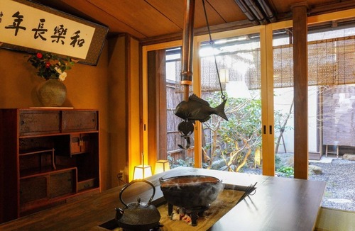 Gion House | The room is a special maisonettetype room with a private garden and a cypress bathtub The room is /Kyoto Kyōto
