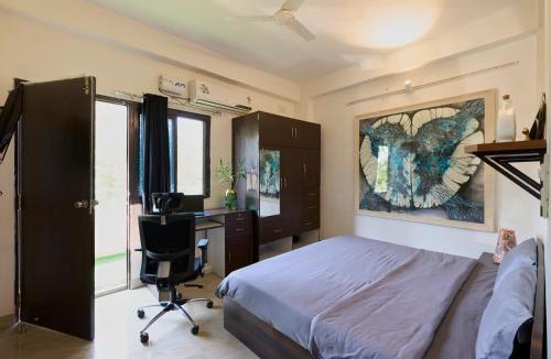 Lake Swaroop Sagar Apartment | TicAna 2 bedroom living & Kitchen with lake view garden rooftop