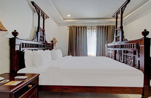 Cherthala Hotel | Treebo Premium Travancore Palace Cherthala