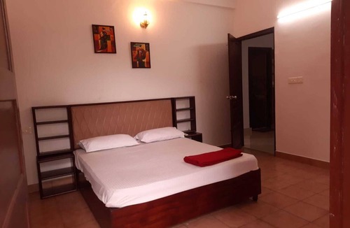 University of Kerala Senate House Campus Apartment | TRV Stays- OPP Mascot Hotel -9 Beds 6 Bath