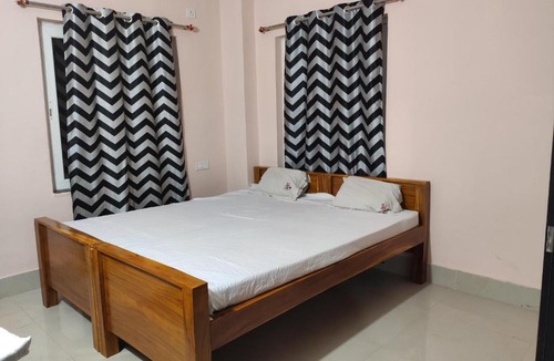 Bhubaneshwar House | Unnmadana - Cozy room in home stay bhubaneswar