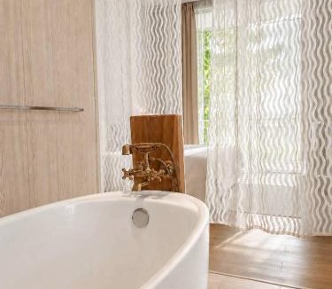 Kamphaeng Phet Hotel | White Wall Riverfront Hotel
