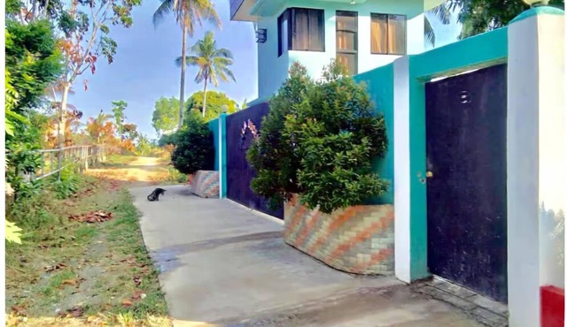 2 Bed with full bath AC, Rooftop and walking distance to beach
