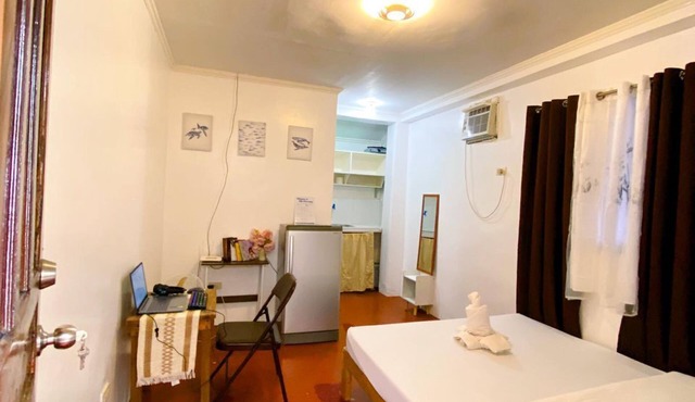 Adorable apartment with AC in vibrant General Luna