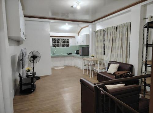 Apartment with a bedroom, living room, kitchen, and a balcony