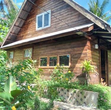 Bayawan Sunset Inn next to julsam and orange house