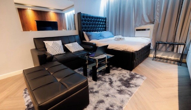 Coastelle Stay - cozy 1-bedroom condo in fabulous Lapu-Lapu with AC