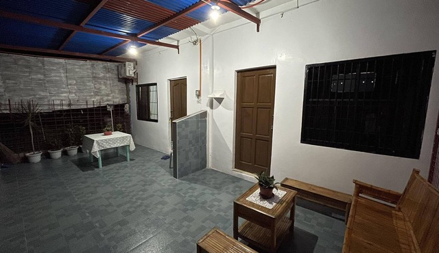 Cozy 1-bedroom apartment with WiFi, AC in tranquil Dauin