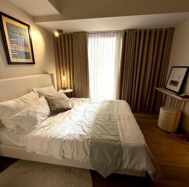 Cozy 1BR in BGC at Park Mckinley West Near Airport