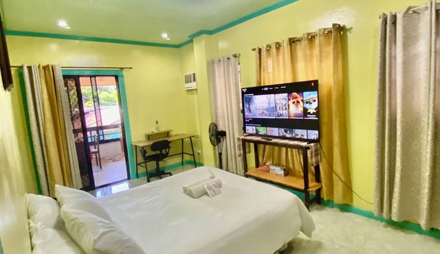 Lens Staycation Serene 2-BDR-1BR-KTCHN-Wifihouse with AC in peaceful Panabo