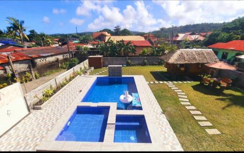 LS Resthouse - Loft studio with pool and garden access