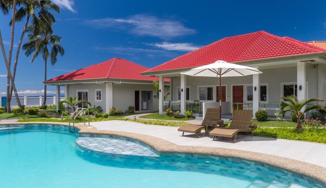 Luxury 2-bedroom Beachfront Villa with AC. Discounted long term stay rates