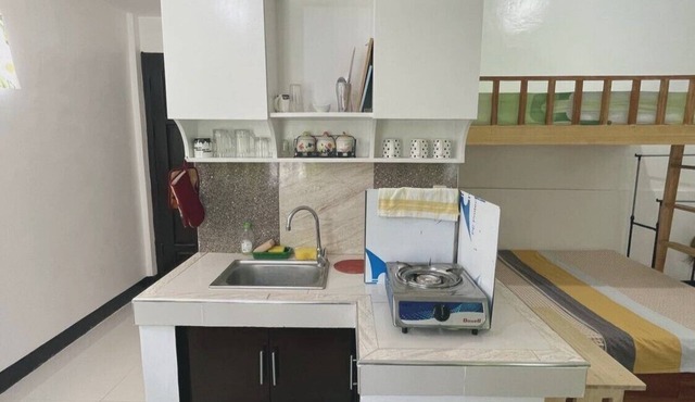 Near white-sand beaches! Studio type w/A/C & kitchen @ Talikud Island.