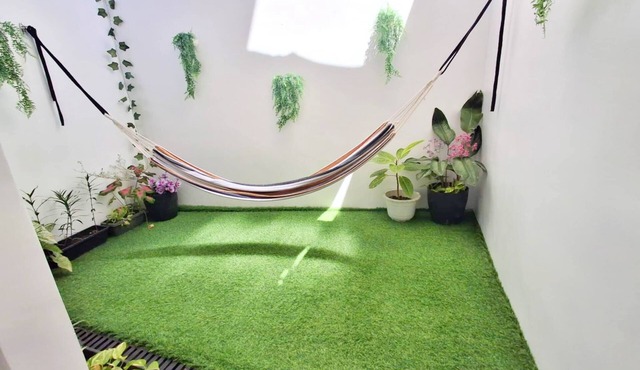 Patio 1st floor 1-bedroom apartment in delightful Dipolog City with AC