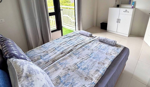 Peaceful 1-bedroom condo with access to pool, gym, and playground in Bohol