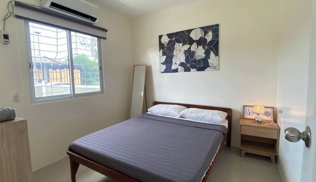 Peaceful 2BR Home in GenSan - AC, WiFi, Netflix, Patio & Free Parking