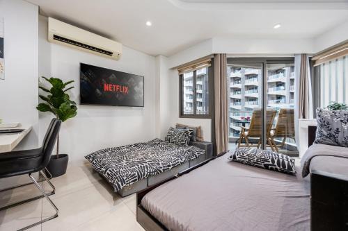 Studio for 5 at Tambuli Residences Garden View by Dominik Studio Apartment with Pool Access & Balcony in Mactan