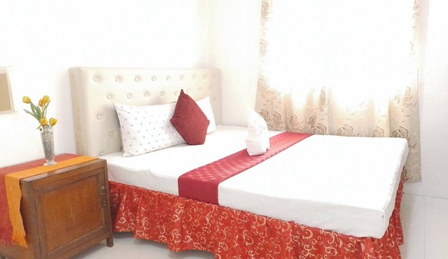 Vacation home at D lucky garden inn 2-bedroom apartment in Puerto Princesa City