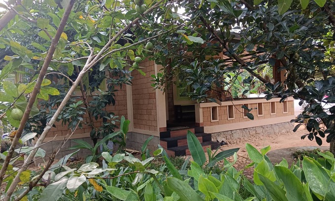 Nedumangad Cottage | A tranquil, riverside earthen home for a comfortable and peaceful stay