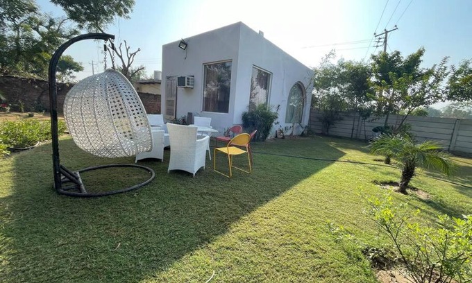 Gurugram House | Adorable bedroom and living room with pool