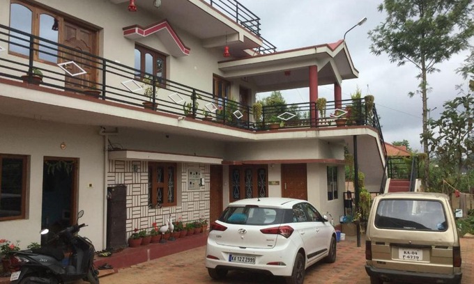 Katakeri Rural House | Coorg Girinivas Deluxe Homestay With Balcony And Wi-Fi
